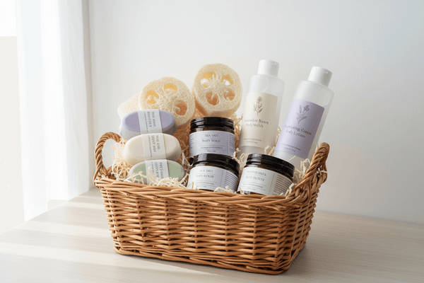 Body care collection displayed in a wicker basket, featuring soaps, creams, and natural sponges for skin nourishment.